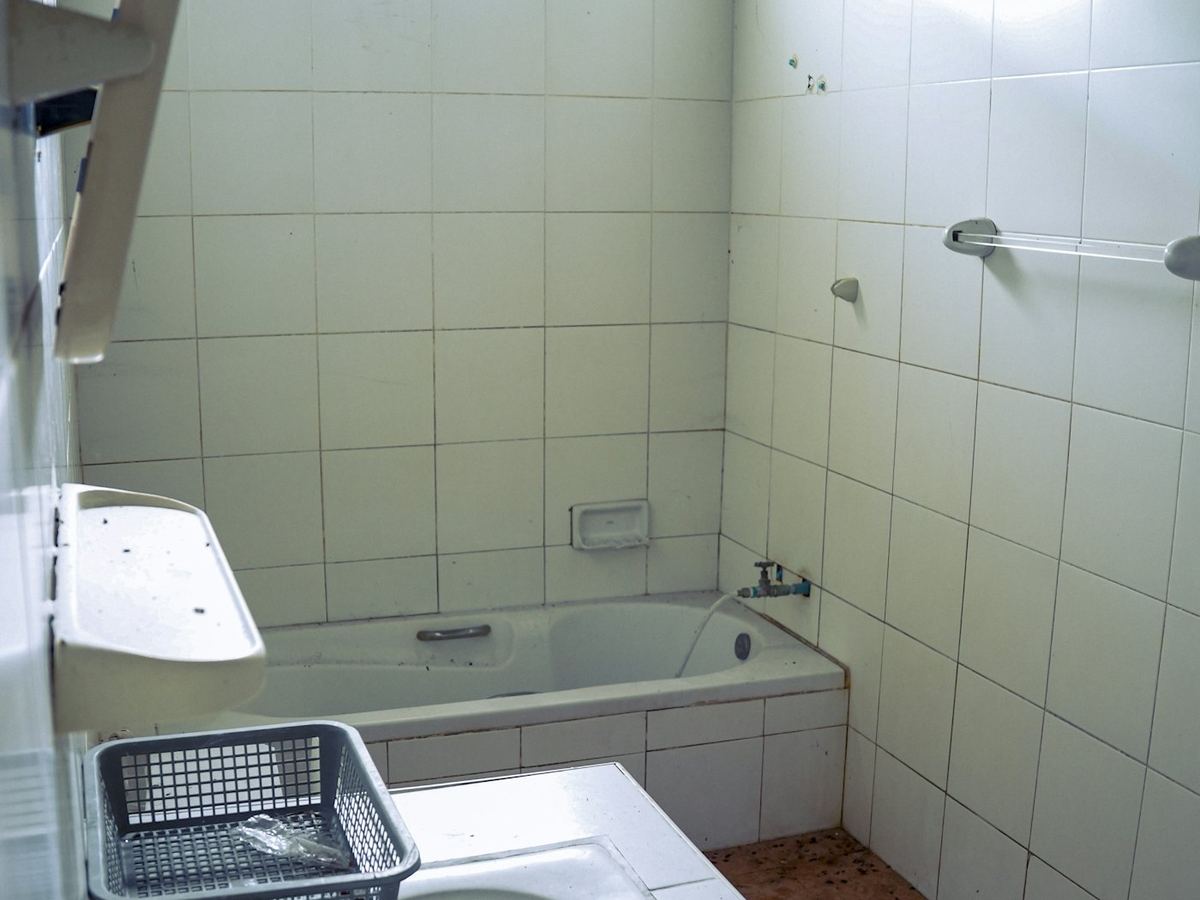 Tub to Walk In Shower in Calera, AL, the bathroom before the renovation