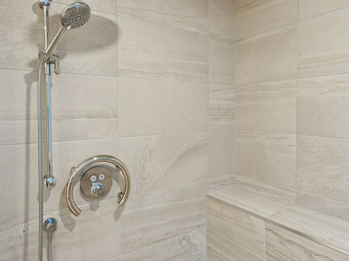 Walk In Shower completed in Vestavia Hills, AL. Curbless shower pan with marble look porcelain on the walls.