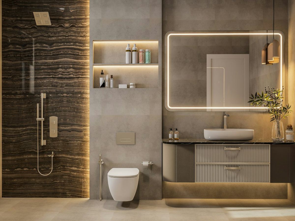 Fully remodeled bathroom with wood accent wall, lit mirror and tiled walk in shower